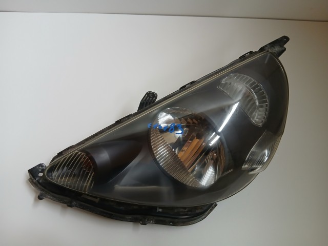 10083 Honda Jazz II. 2002-2008 Lámpa , Fényszóró Használt Bal első 