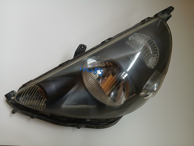 10083 Honda Jazz II. 2002-2008 Lámpa , Fényszóró Használt Bal első 